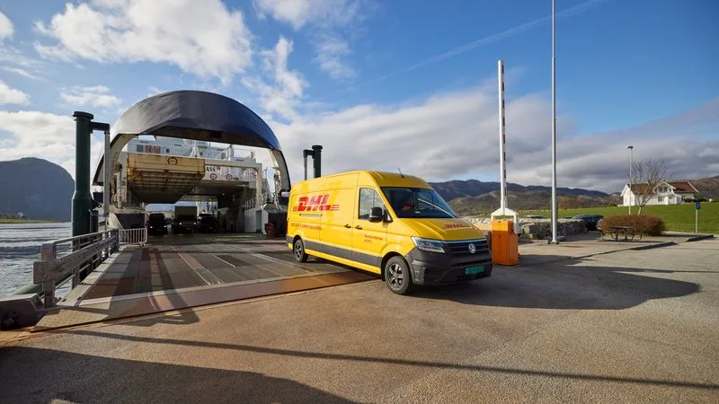 dhl express courier delivering time-sensitive shipments in van