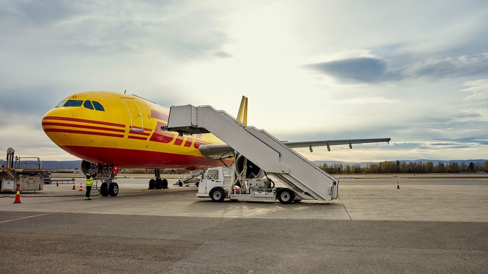 dhl express plane preparing for air cargo shipping in bangladesh, as part of their e-commerce solutions