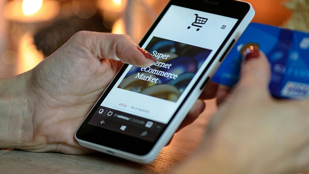 woman browsing popular e-commerce products in Cambodia on her phone