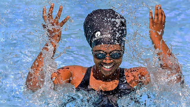 Woman with swimming cap in pool