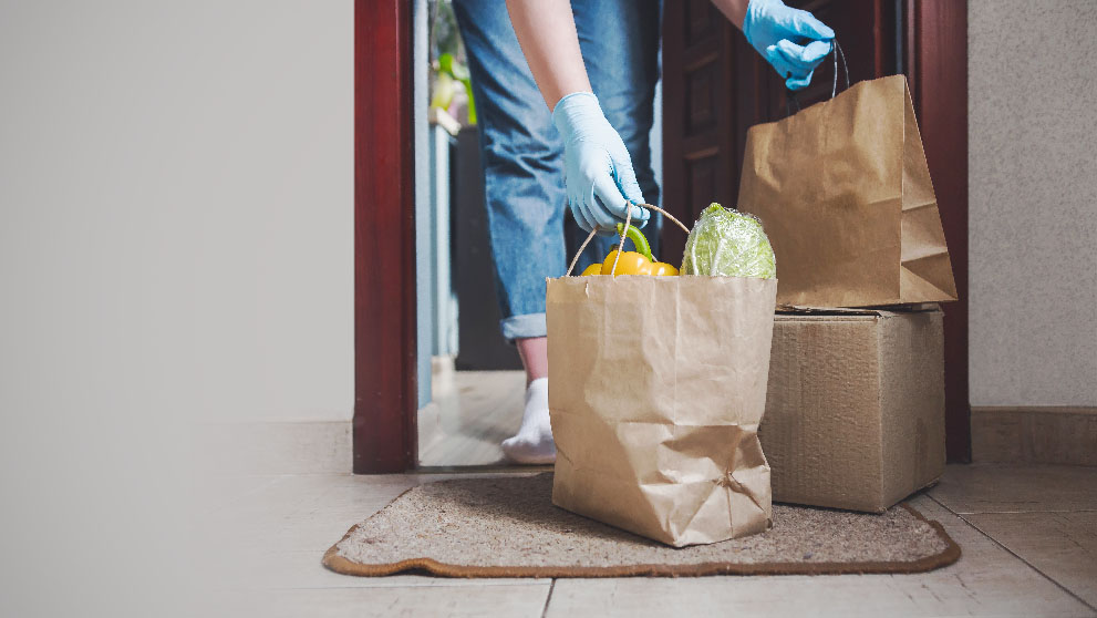 a person collecting delivered goods