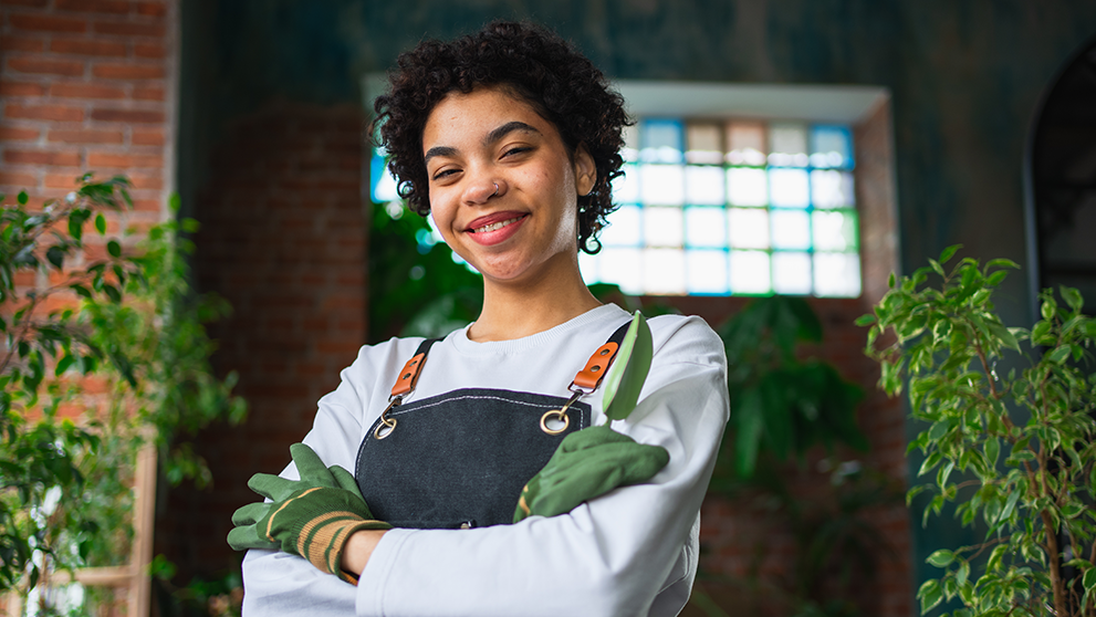 woman wearing gloves and smiling