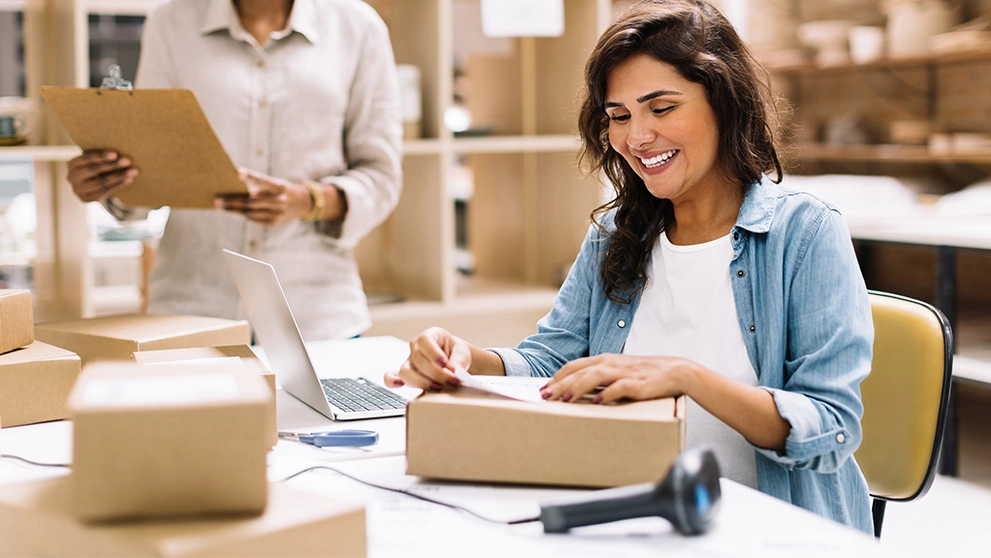 woman packing parcels