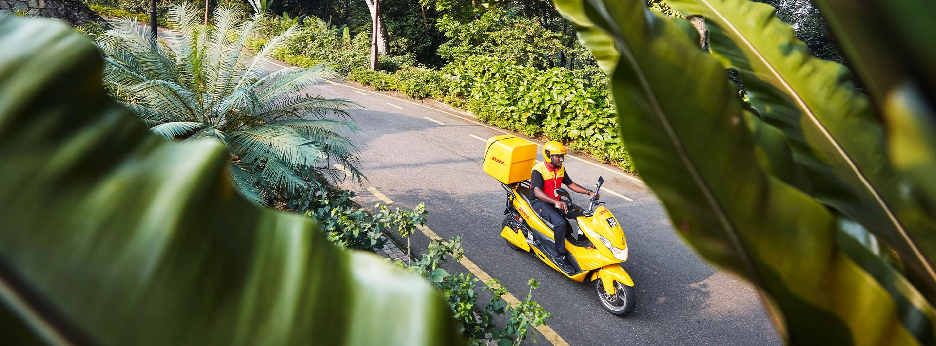 DHL courier on a motorbike