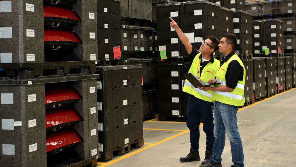 two men in a warehouse