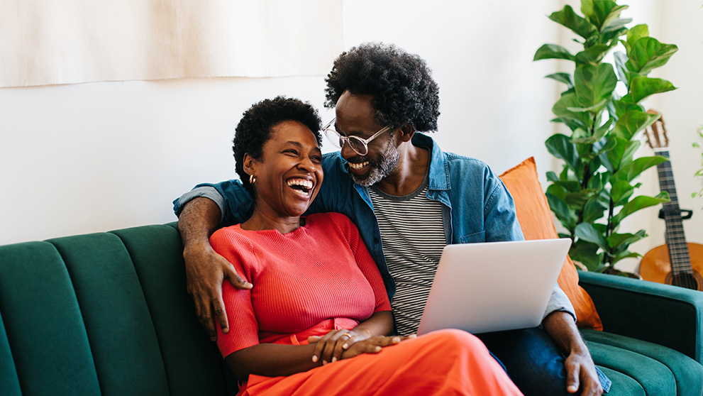 man and woman smiling at each other