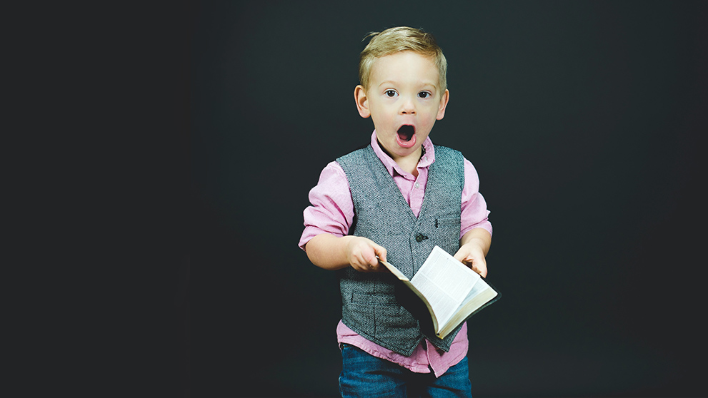 little boy with mouth open