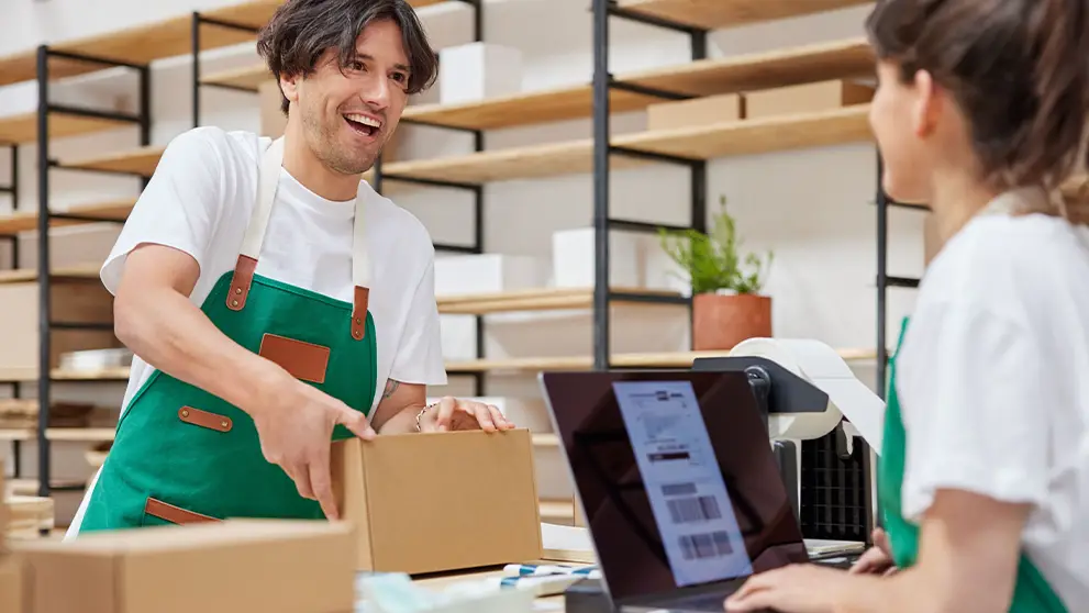 man smiling at woman