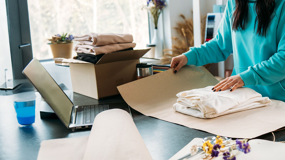 woman wrapping clothes