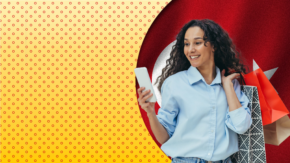 woman smiling at mobile phone