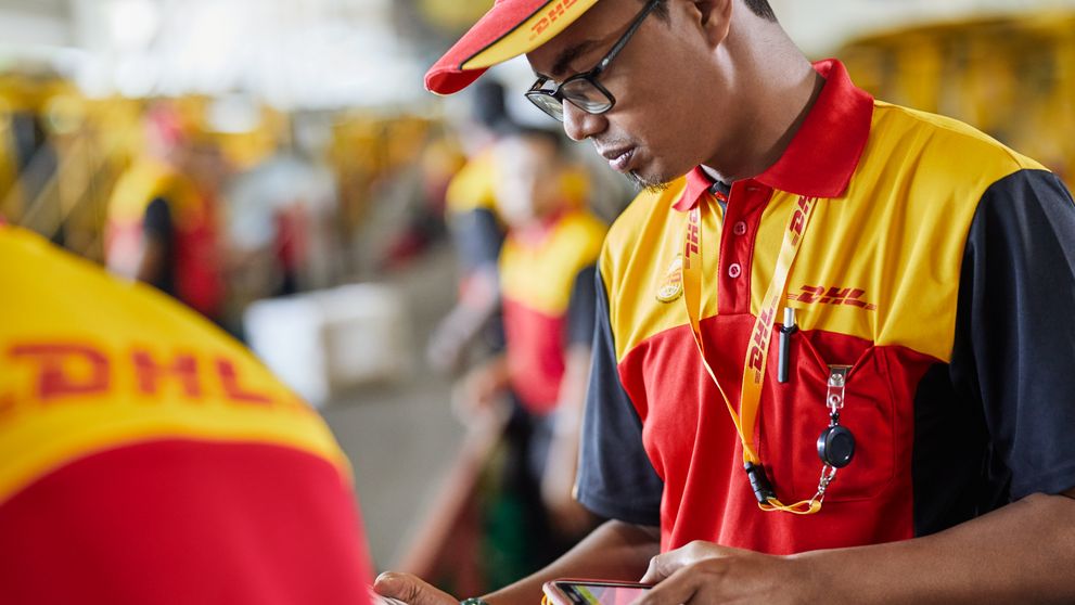 dhl express logistics staff checks for halal certification requirements