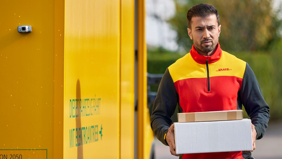 dhl employee delivering an e-commerce parcel