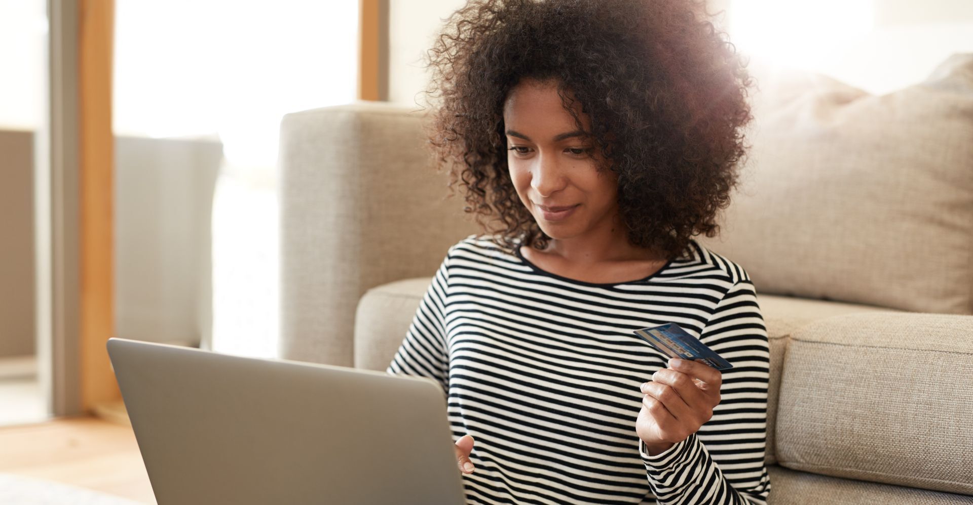 a woman completing her e-commerce transaction via a payment gateway