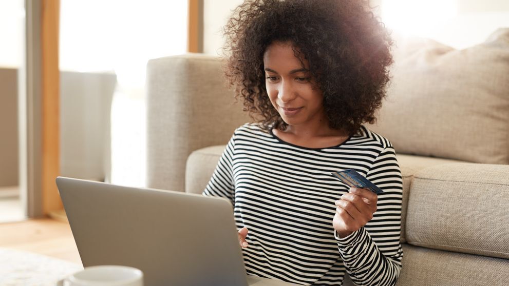 a woman completing her e-commerce transaction via a payment gateway