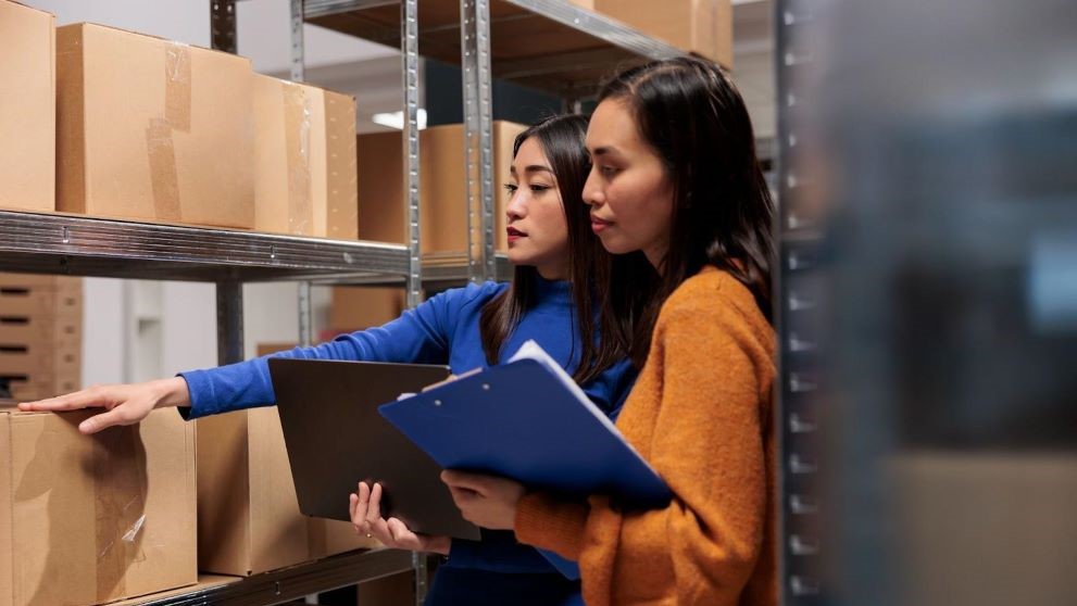 e-commerce workers ensuring proper inventory management in a warehouse